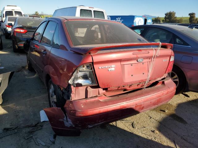 1FAHP34N05W197512 - 2005 FORD FOCUS ZX4 RED photo 2