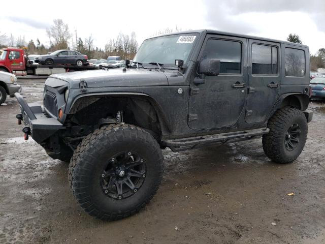1J4BA3H19AL131300 - 2010 JEEP WRANGLER U SPORT ნაცრისფერი ფოტო 1