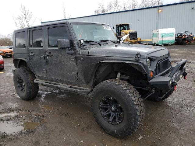 1J4BA3H19AL131300 - 2010 JEEP WRANGLER U SPORT ნაცრისფერი ფოტო 4