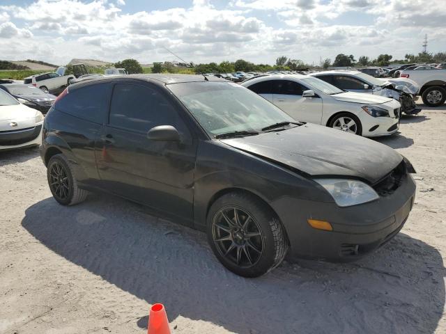 1FAFP31NX7W129569 - 2007 FORD FOCUS ZX3 BLACK photo 4