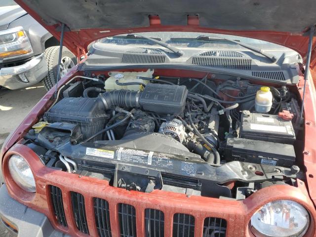 1J4GL48K02W236824 - 2002 JEEP LIBERTY SPORT ORANGE photo 12