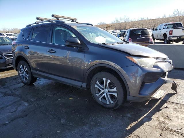 2T3BFREV7HW660897 - 2017 TOYOTA RAV4 LE CHARCOAL photo 4