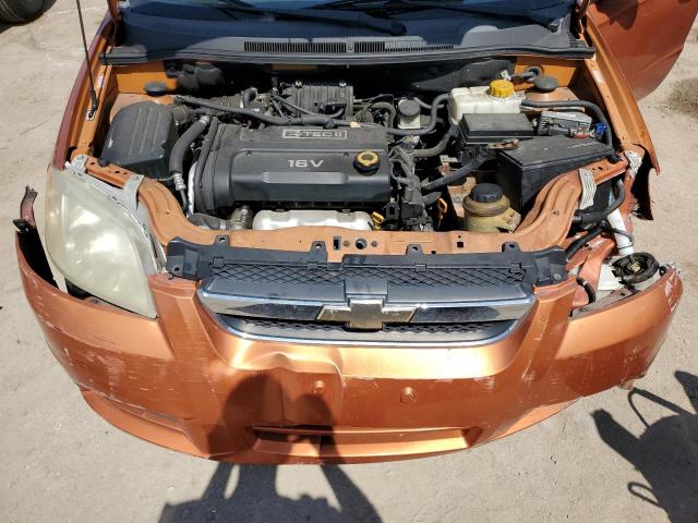 KL1TD56638B075910 - 2008 CHEVROLET AVEO BASE ORANGE photo 11