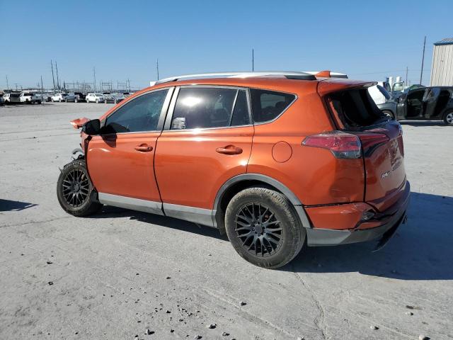 2T3ZFREV4GW306011 - 2016 TOYOTA RAV4 LE ORANGE photo 2