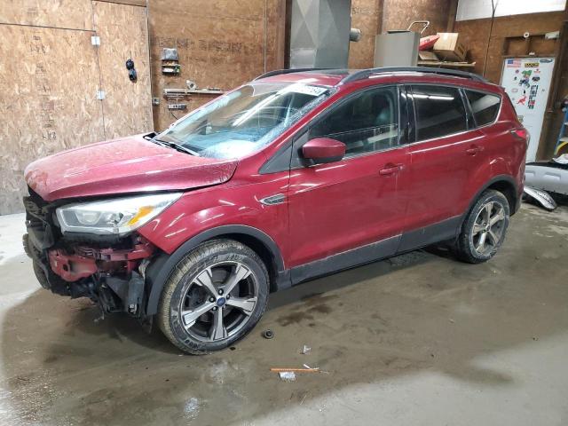 1FMCU9G94HUA21234 - 2017 FORD ESCAPE SE BURGUNDY photo 1