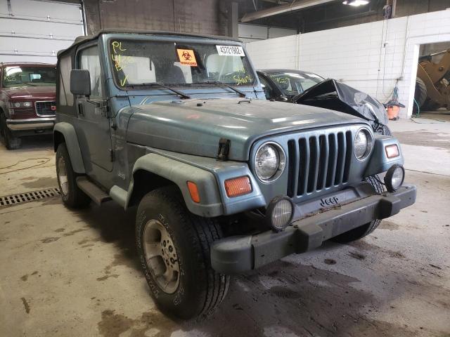 1J4FY19S2XP458891 - 1999 JEEP WRANGLER / SPORT BLUE photo 1