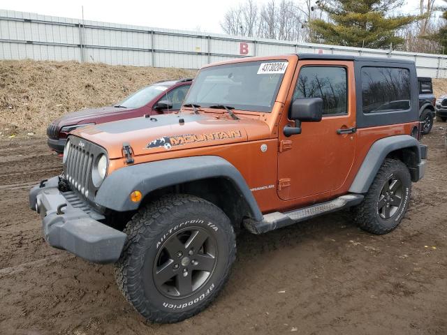 1J4AA2D12AL195805 - 2010 JEEP WRANGLER SPORT ORANGE photo 1