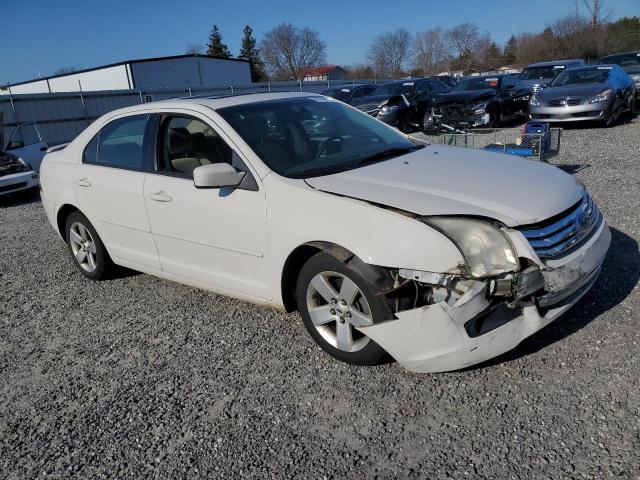 3FAHP07Z78R163264 - 2008 FORD FUSION SE WHITE photo 4