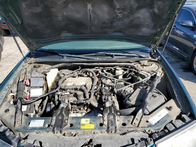 2G1WF52E119248188 - 2001 CHEVROLET IMPALA GREEN photo 11