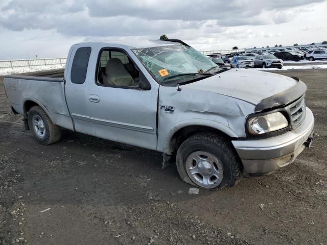 1FTRX18L9XNB53609 - 1999 FORD F150 SILVER photo 4