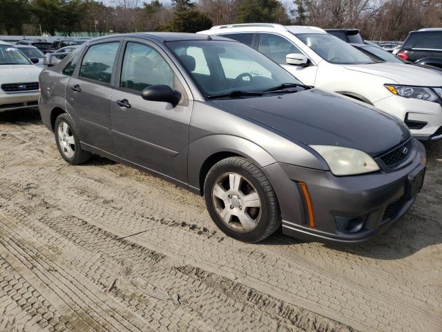 1FAHP34N96W152568 - 2006 FORD FOCUS ZX4 GRAY photo 4