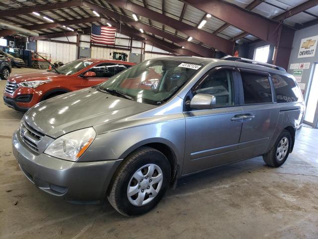 KNDMG4C37A6327861 - 2010 KIA SEDONA LX GRAY photo 1