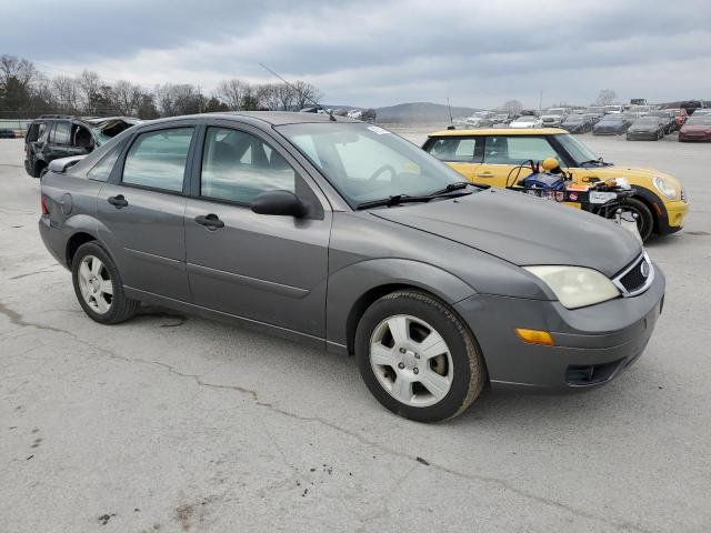 1FAHP34N16W144657 - 2006 FORD FOCUS ZX4 GRAY photo 4