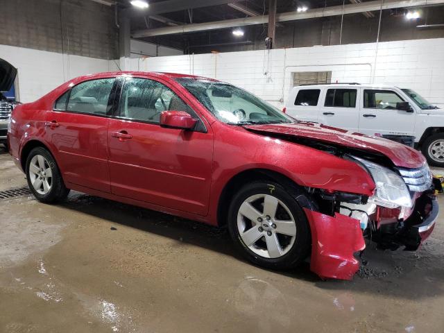 3FAHP07Z99R165065 - 2009 FORD FUSION SE RED photo 4