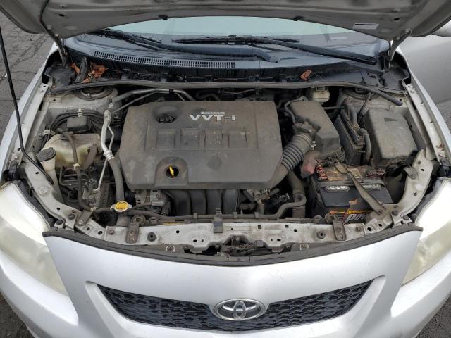 1NXBU4EE1AZ318837 - 2010 TOYOTA COROLLA BASE SILVER photo 11