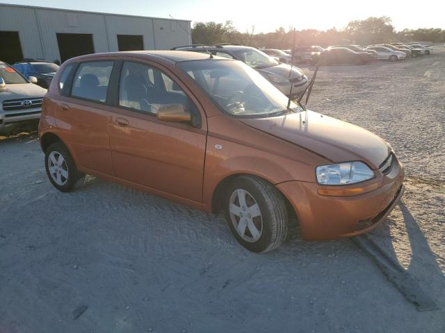 KL1TD66606B673035 - 2006 CHEVROLET AVEO BASE ORANGE photo 4