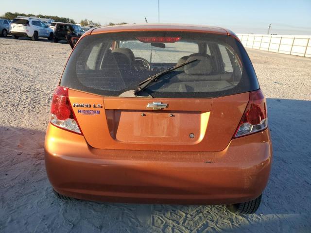 KL1TD66606B673035 - 2006 CHEVROLET AVEO BASE ORANGE photo 6