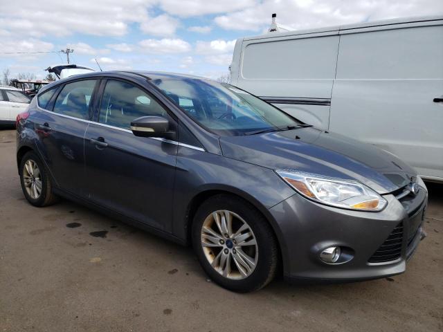 1FAHP3M23CL193359 - 2012 FORD FOCUS SEL GRAY photo 4