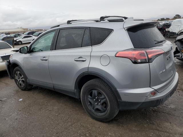 2T3ZFREV9HW337255 - 2017 TOYOTA RAV4 LE SILVER photo 2