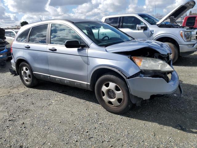 JHLRE38399C002143 - 2009 HONDA CR-V LX SILVER photo 4