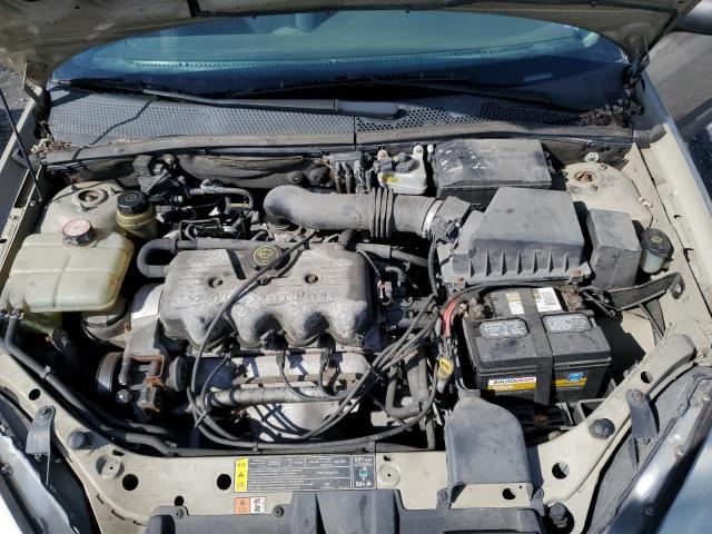 1FAFP33P1YW320197 - 2000 FORD FOCUS LX TAN photo 11