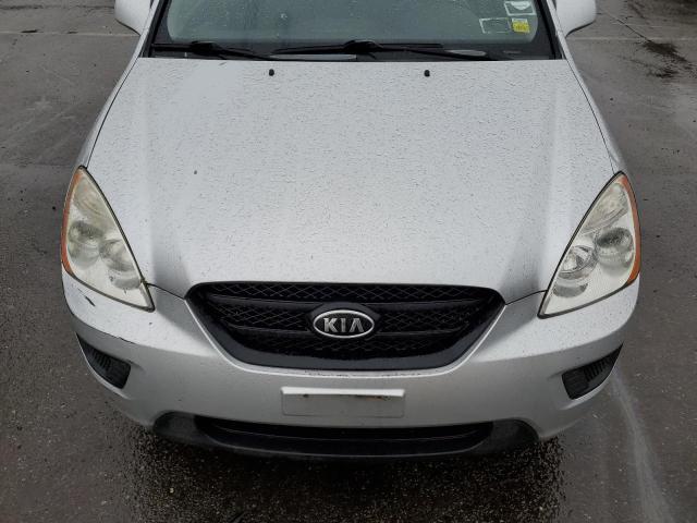 KNAFG528597266069 - 2009 KIA RONDO BASE SILVER photo 11