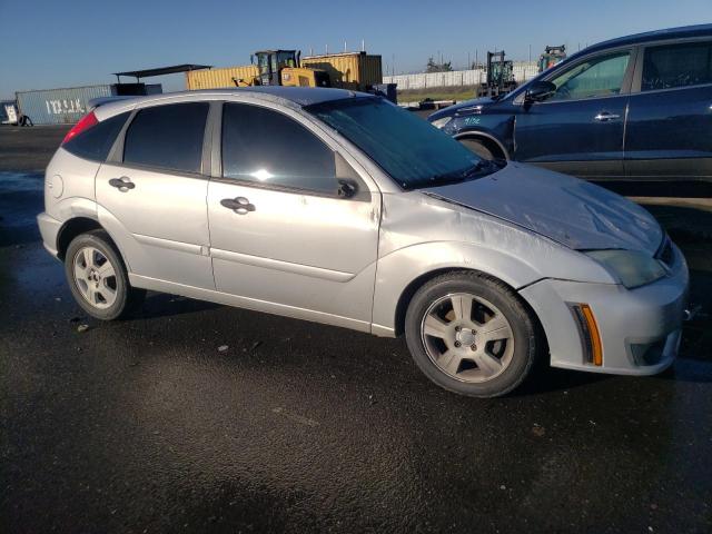 1FAHP37N47W184647 - 2007 FORD FOCUS ZX5 SILVER photo 4