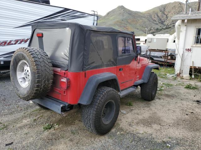 1J4FA49S9YP792410 - 2000 JEEP WRANGLER / SPORT RED photo 4