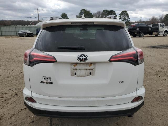 JTMZFREV8JJ752331 - 2018 TOYOTA RAV4 LE WHITE photo 6