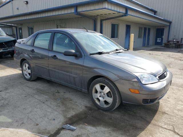 1FAFP34N57W332154 - 2007 FORD FOCUS ZX4 GRAY photo 4