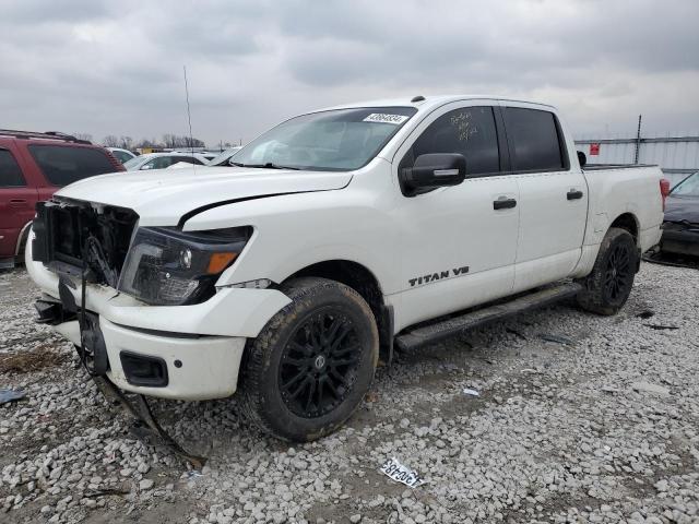 1N6AA1E59KN524391 - 2019 NISSAN TITAN SV WHITE photo 1