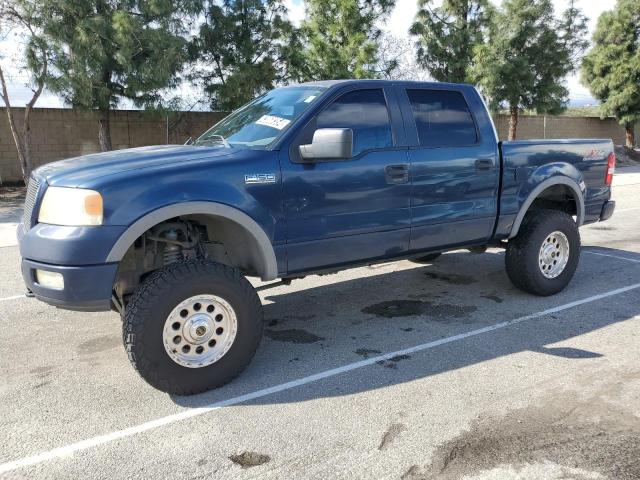 1FTPW14515FA74721 - 2005 FORD F150 SUPERCREW BLUE photo 1