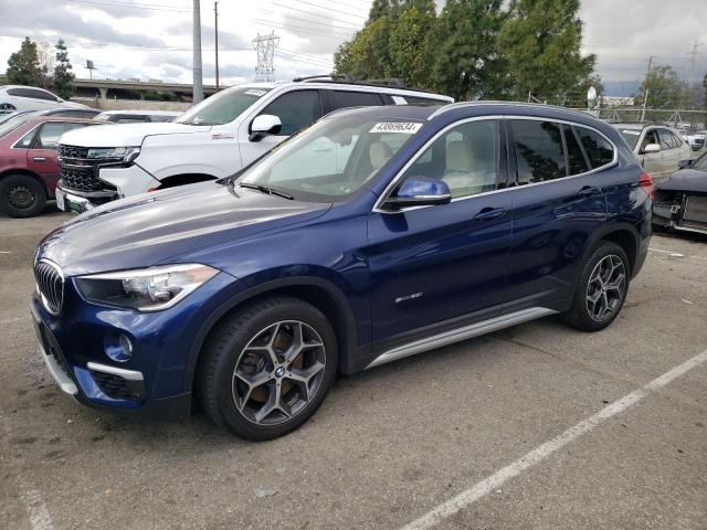 WBXHU7C30J5H44858 - 2018 BMW X1 SDRIVE28I BLUE photo 1