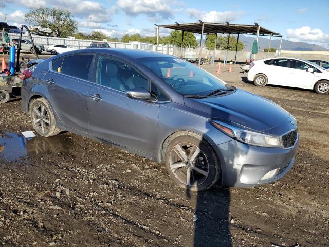 3KPFL4A89JE178222 - 2018 KIA FORTE EX SILVER photo 4