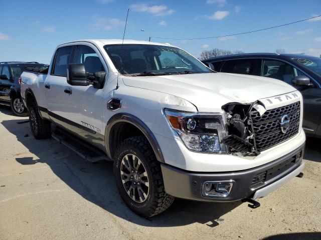 1N6BA1F40JN549611 - 2018 NISSAN TITAN XD SL WHITE photo 4