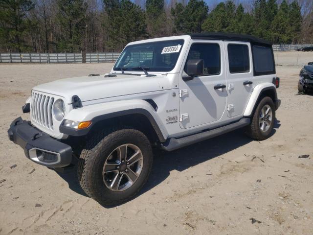 1C4HJXEN4JW327951 - 2018 JEEP WRANGLER U SAHARA WHITE photo 1
