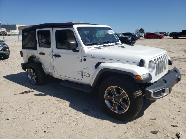 1C4HJXEN4JW327951 - 2018 JEEP WRANGLER U SAHARA WHITE photo 4