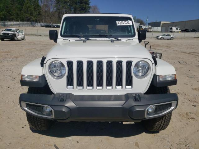 1C4HJXEN4JW327951 - 2018 JEEP WRANGLER U SAHARA WHITE photo 5