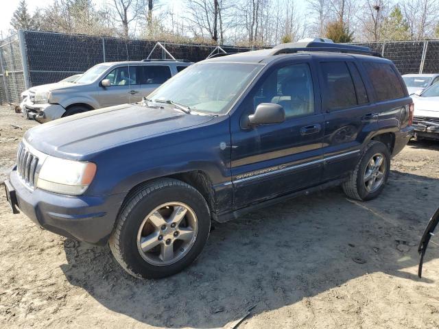 1J8GW68J64C355328 - 2004 JEEP GRAND CHER OVERLAND BLUE photo 1