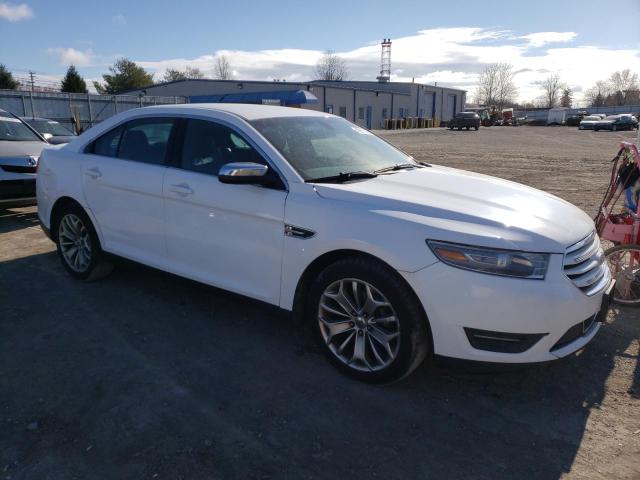 1FAHP2F81EG100653 - 2014 FORD TAURUS LIM WHITE photo 4