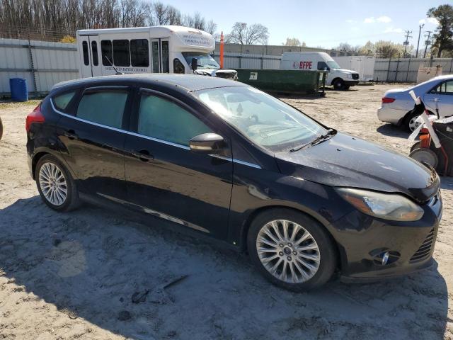 1FAHP3N20CL347251 - 2012 FORD FOCUS TITANIUM BLACK photo 4