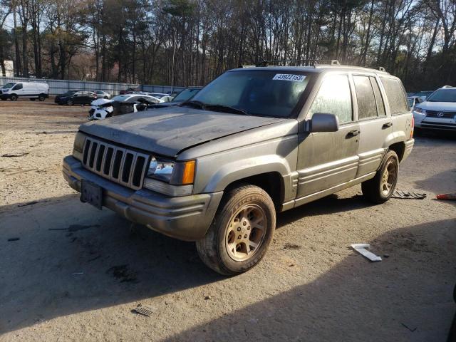 1J4GZ78Y3WC220239 - 1998 JEEP CHEROKEE LIMITED TAN photo 1