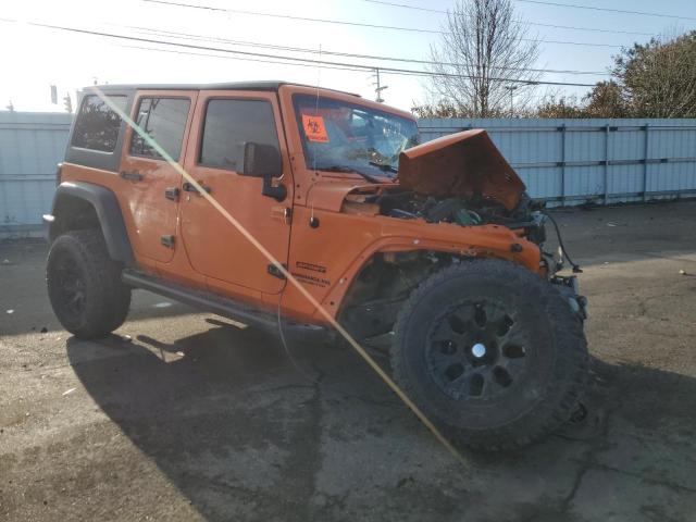 1C4BJWDG3CL190458 - 2012 JEEP WRANGLER U SPORT ORANGE photo 4