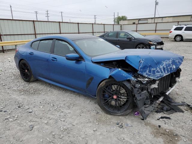WBAGV8C00LCD53156 - 2020 BMW M850XI BLUE photo 4