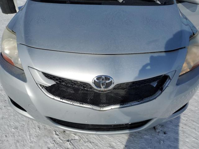 JTDBT903181263392 - 2008 TOYOTA YARIS SILVER photo 11