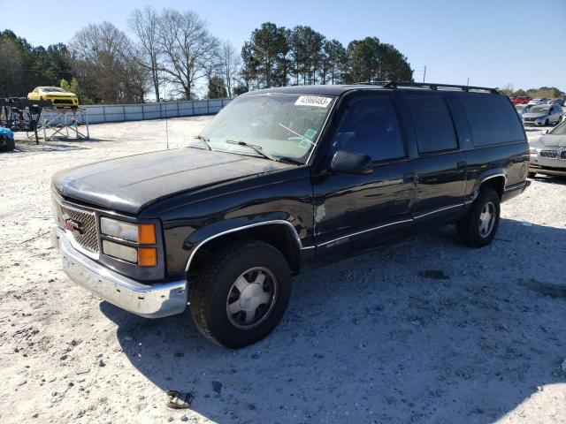 3GKEC16R1XG539973 - 1999 GMC SUBURBAN C1500 BLACK photo 1