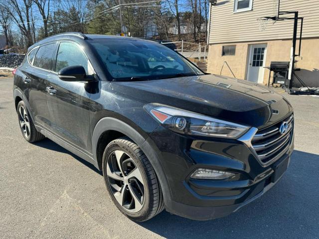 KM8J3CA23GU116689 - 2016 HYUNDAI TUCSON LIMITED BLACK photo 4