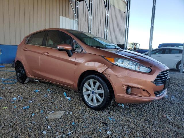 3FADP4FJ1HM138844 - 2017 FORD FIESTA TITANIUM ORANGE photo 4