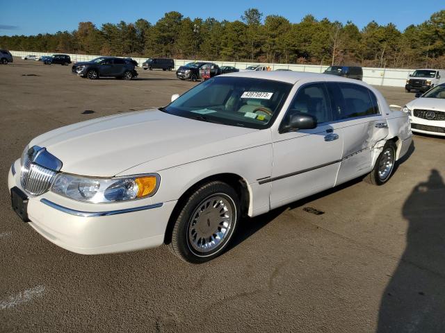 1LNHM83W9YY900250 - 2000 LINCOLN TOWN CARTIER WHITE photo 1