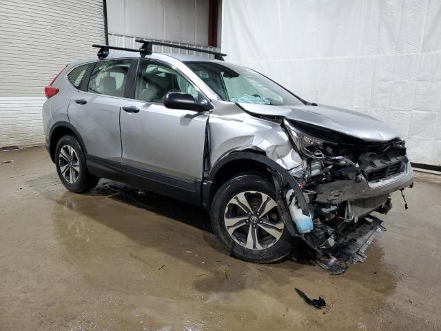 2HKRW6H31KH227744 - 2019 HONDA CR-V LX SILVER photo 4